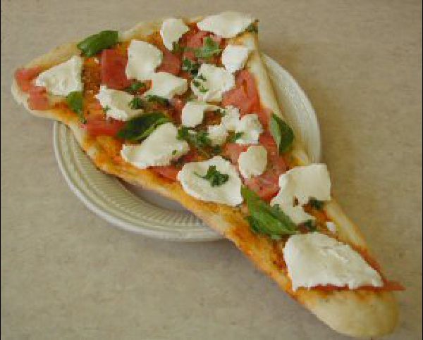 Pizza Rustica with fresh basil and mozzarella cheese from Francesca's Pizzeria and Restaurant in Great Neck, NY